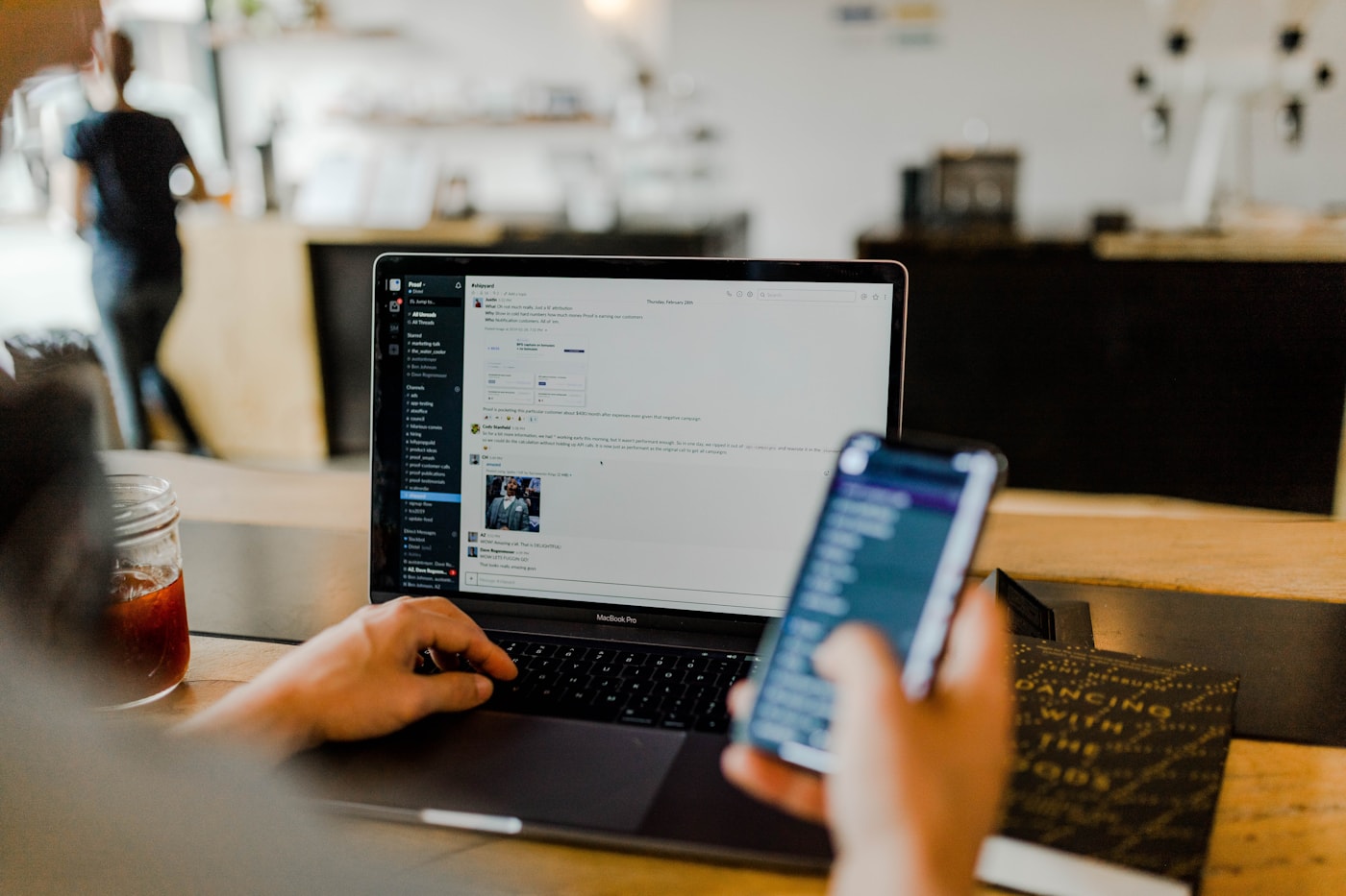 Professional presenting marketing strategy on laptop and mobile